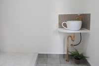 玄関の手洗いは、かわいいコーヒーカップ形。
毎日使う場所だからこそ、こだわりのアイテムを設置。